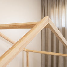 Close-up of the natural pine roof joint on the NOLRI Montessori house floor bed for toddlers