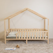 Front view of NOLRI Montessori toddler house bed on legs with rounded opening and natural pine safety rails